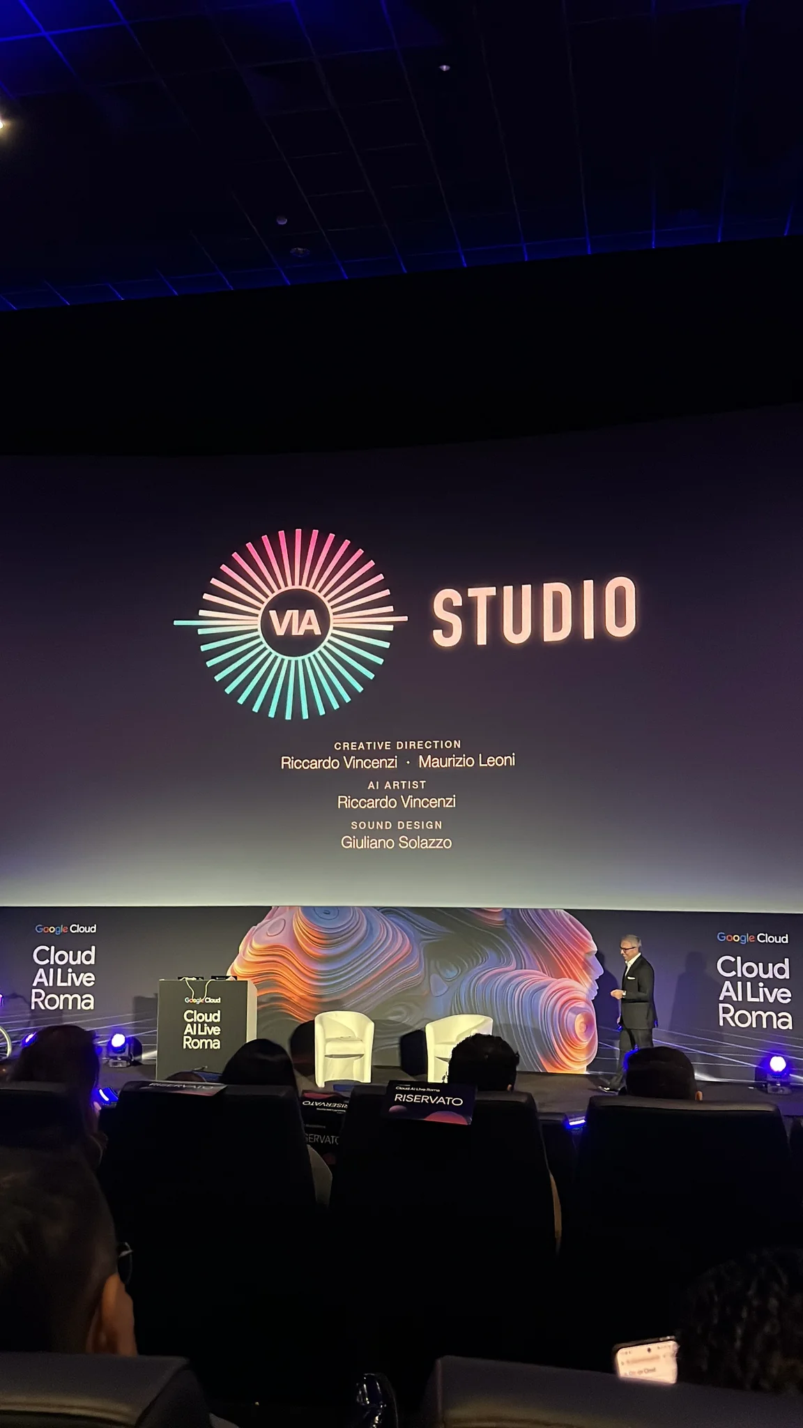 VIA Studio credits projected above the Google Cloud AI Live Roma stage